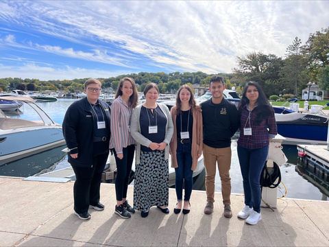 Group folder of the many members of the lab that attended the ASR conference.