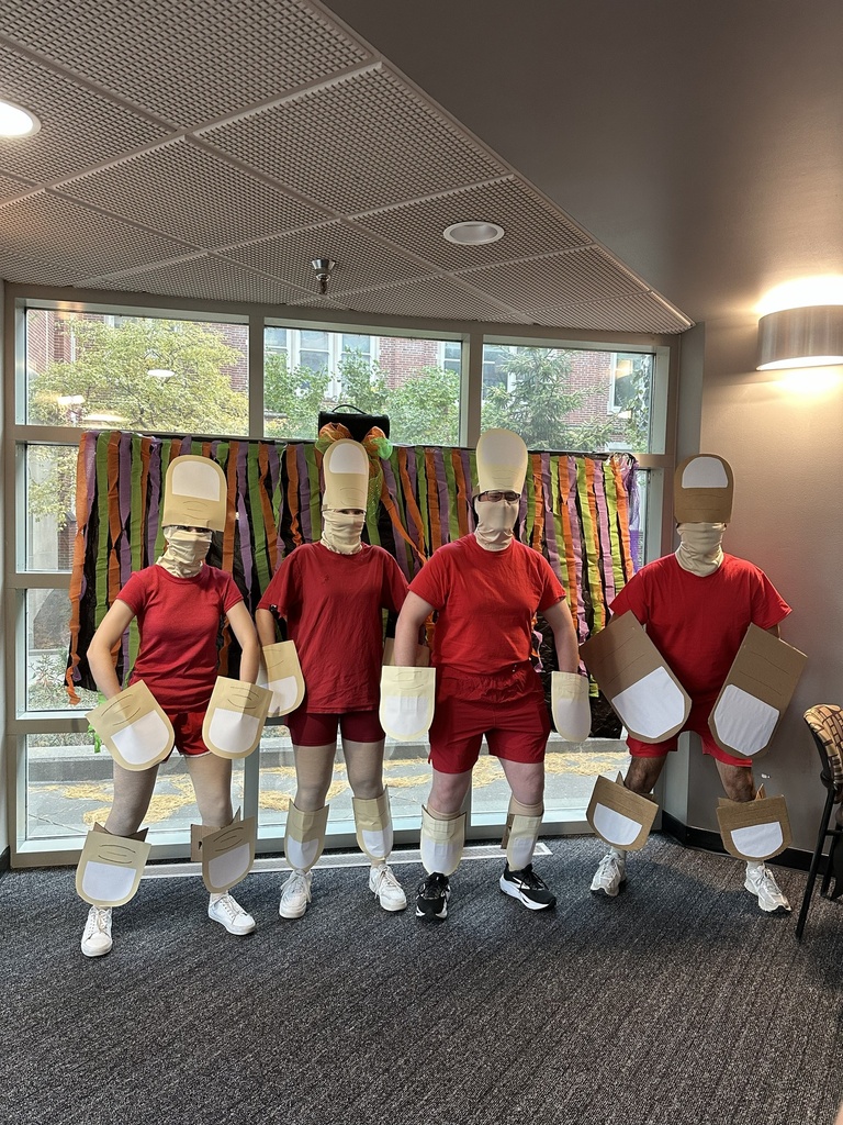 Image depicting members of the lab dressed up as Thumb-Thumbs from Spy Kids.